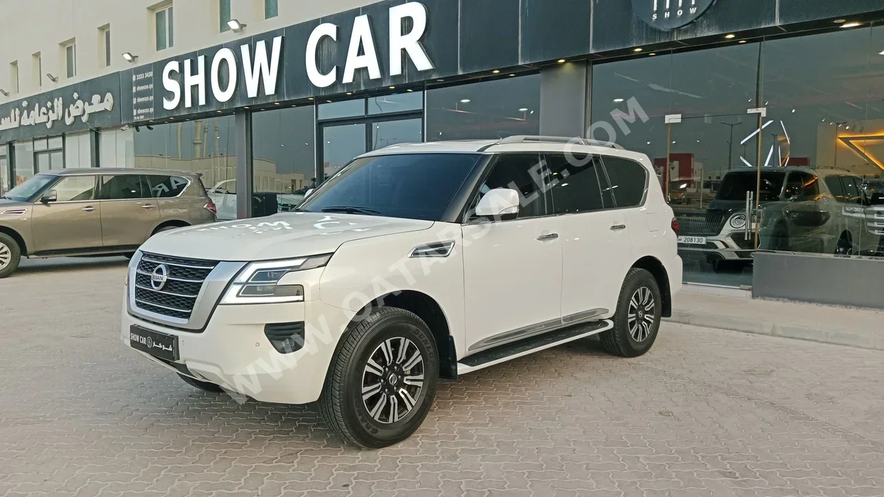 Nissan  Patrol  Titanium  2020  Automatic  99,000 Km  8 Cylinder  Four Wheel Drive (4WD)  SUV  White