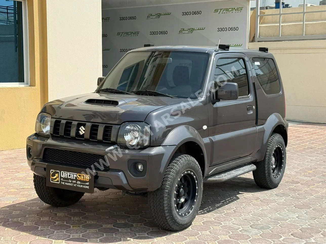 Suzuki  Jimny  2018  Automatic  14,500 Km  4 Cylinder  Four Wheel Drive (4WD)  SUV  Gray