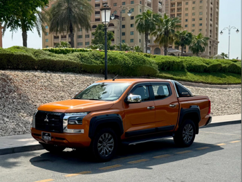 Mitsubishi  L 200  Diesel  2024  Automatic  11,000 Km  4 Cylinder  All Wheel Drive (AWD)  Pick Up  Orange  With Warranty