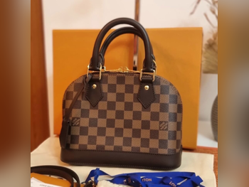 Bags  - Louis Vuitton  - Brown  - Genuine Leather  - For Women