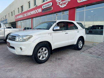 Toyota  Fortuner  2010  Automatic  223,000 Km  4 Cylinder  Four Wheel Drive (4WD)  SUV  White