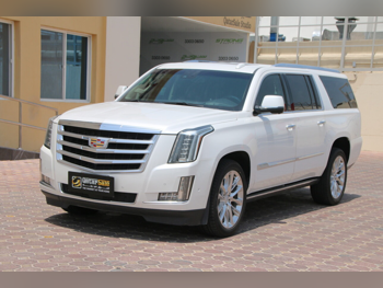 Cadillac  Escalade  2018  Automatic  115,000 Km  8 Cylinder  Four Wheel Drive (4WD)  SUV  White