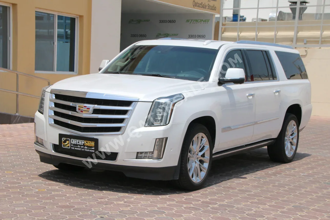 Cadillac  Escalade  2018  Automatic  115,000 Km  8 Cylinder  Four Wheel Drive (4WD)  SUV  White