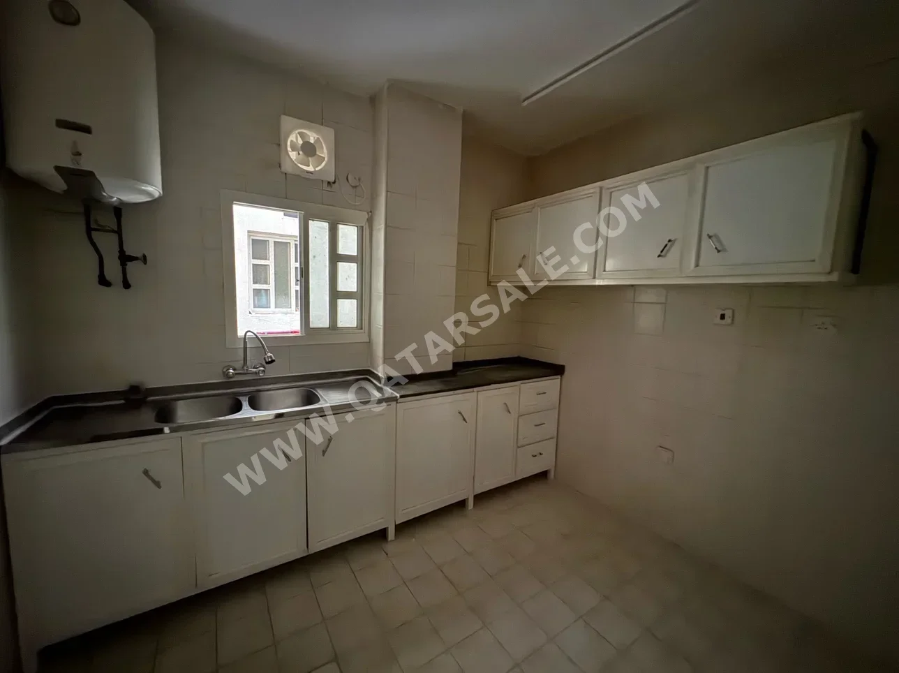 2 Bedrooms  Apartment  For Rent  in Doha -  Al Mansoura  Not Furnished