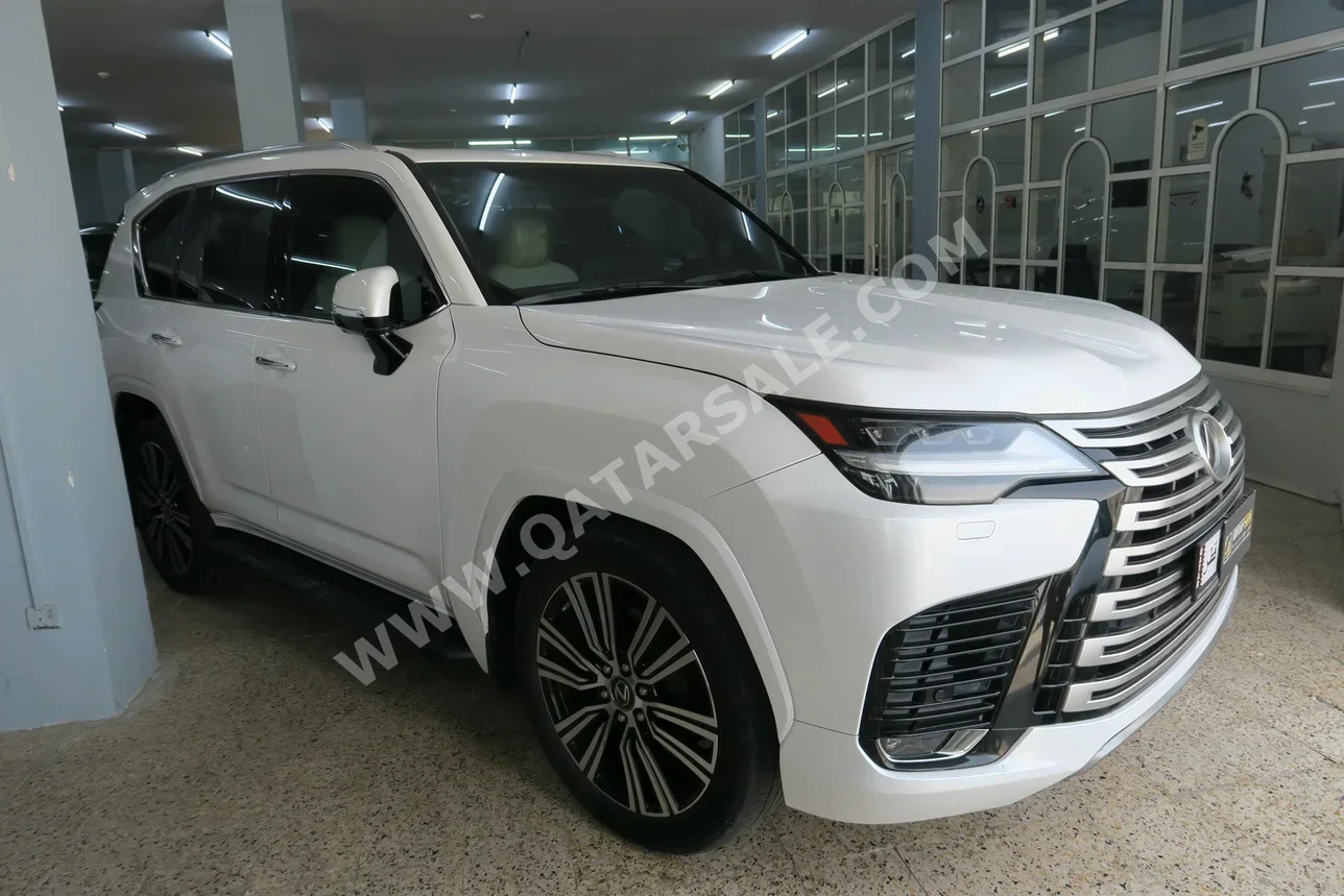 Lexus  LX  600 Luxury  2022  Automatic  84,000 Km  6 Cylinder  Four Wheel Drive (4WD)  SUV  White  With Warranty