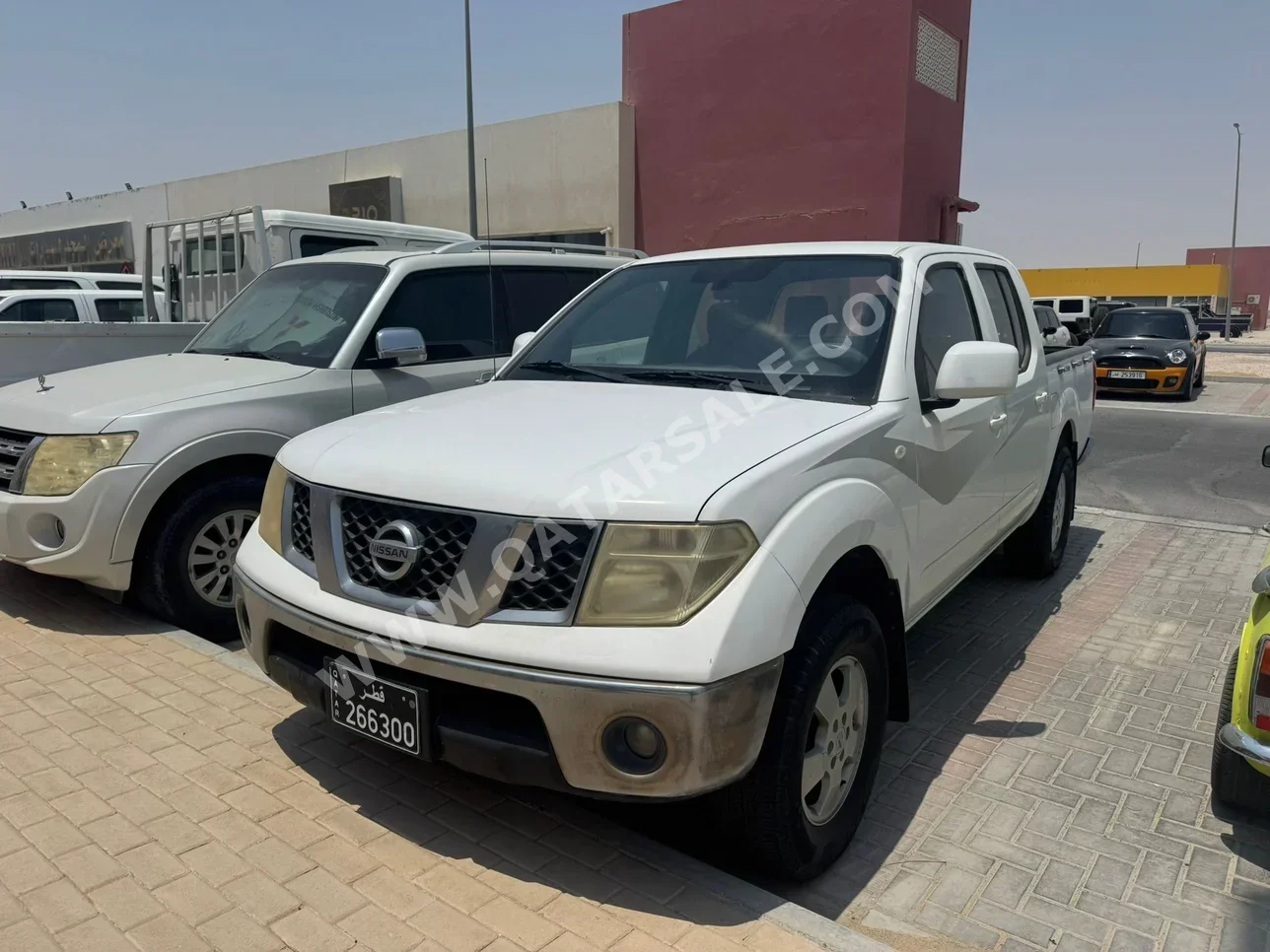 Nissan  Navara  SE  2014  Automatic  283,000 Km  4 Cylinder  Rear Wheel Drive (RWD)  Pick Up  Silver