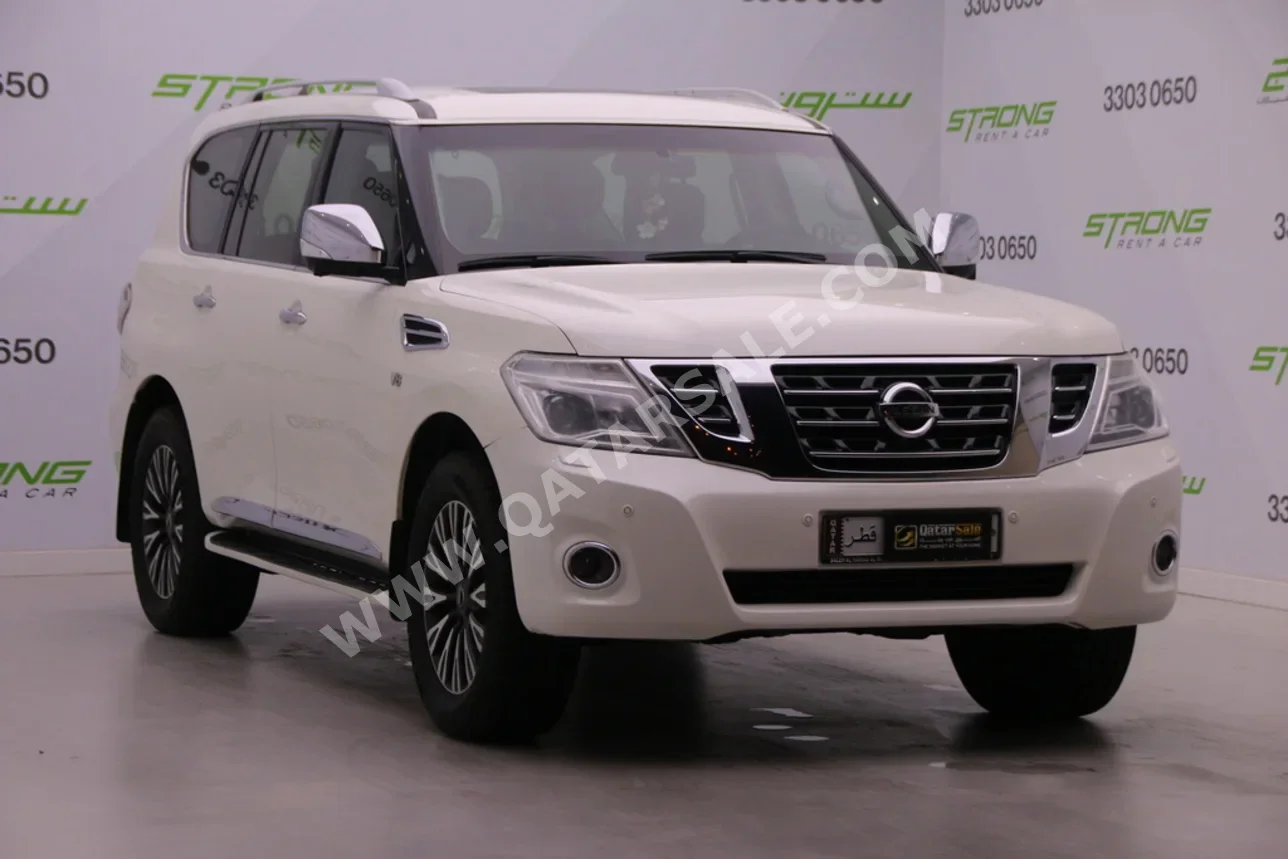 Nissan  Patrol  Platinum  2015  Automatic  168,000 Km  8 Cylinder  Four Wheel Drive (4WD)  SUV  Pearl