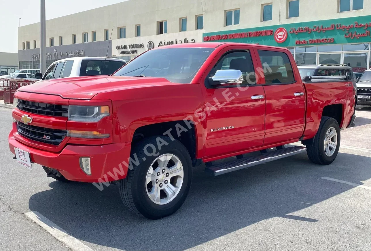 Chevrolet  Silverado  LT  2016  Automatic  248,000 Km  8 Cylinder  Four Wheel Drive (4WD)  Pick Up  Red
