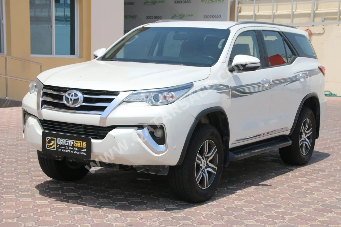 Toyota  Fortuner  2016  Automatic  248,000 Km  4 Cylinder  Four Wheel Drive (4WD)  SUV  White