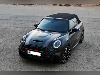 Mini  Cooper  JCW  2022  Automatic  12,000 Km  4 Cylinder  Front Wheel Drive (FWD)  Convertible  Dark Green