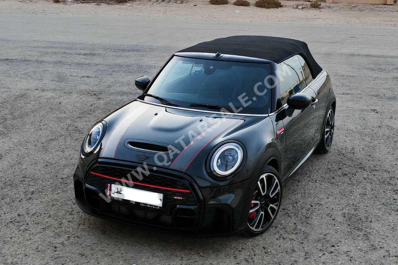 Mini  Cooper  JCW  2022  Automatic  12,000 Km  4 Cylinder  Front Wheel Drive (FWD)  Convertible  Dark Green