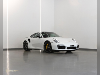 بورش  911  توربو اس  2015  اوتوماتيك  22,600 كم  6 سلندر  دفع خلفي  كوبيه \ سبورت  أبيض  تحت الضمان