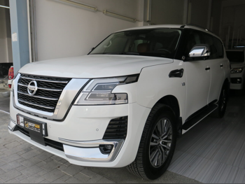 Nissan  Patrol  Platinum  2020  Automatic  56,000 Km  8 Cylinder  Four Wheel Drive (4WD)  SUV  White