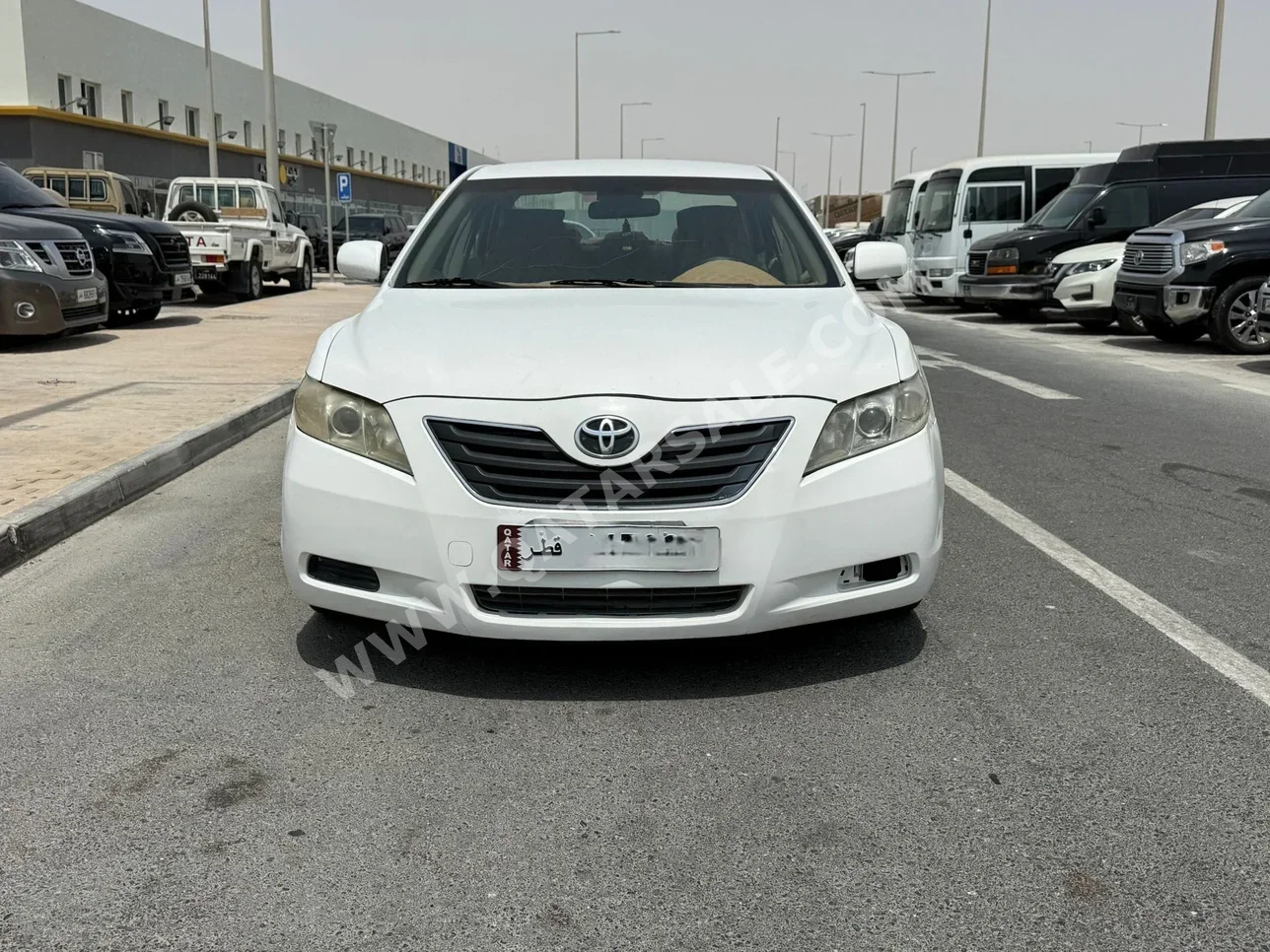 Toyota  Camry  GL  2009  Automatic  358,000 Km  4 Cylinder  Front Wheel Drive (FWD)  Sedan  White