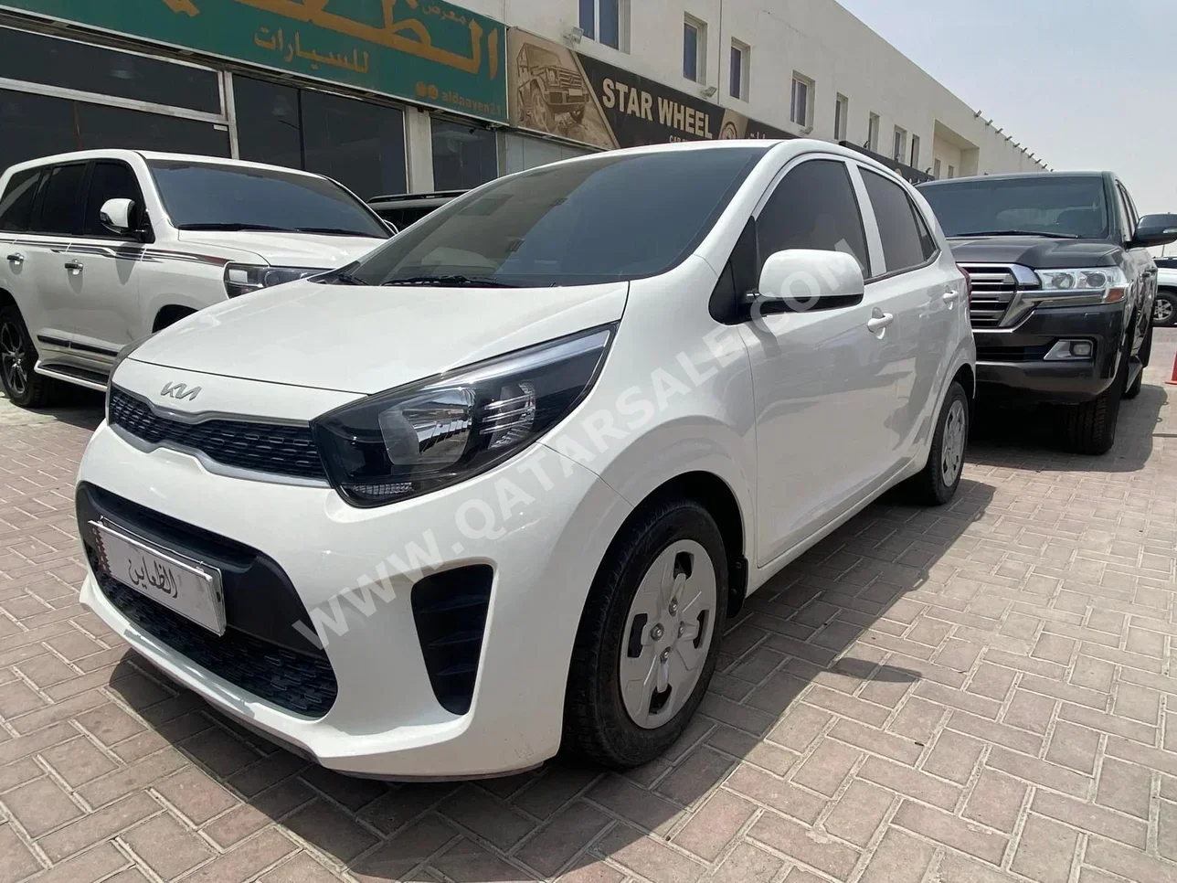 Kia  Picanto  2023  Automatic  9,000 Km  4 Cylinder  Front Wheel Drive (FWD)  Sedan  White  With Warranty