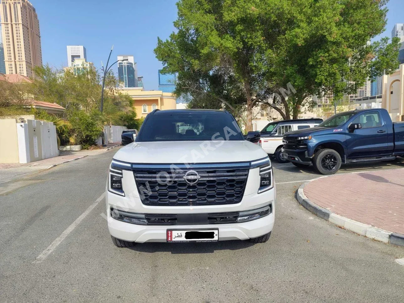 Nissan  Patrol  SE Platinum  2025  Automatic  5,000 Km  6 Cylinder  Four Wheel Drive (4WD)  SUV  White and Black  With Warranty