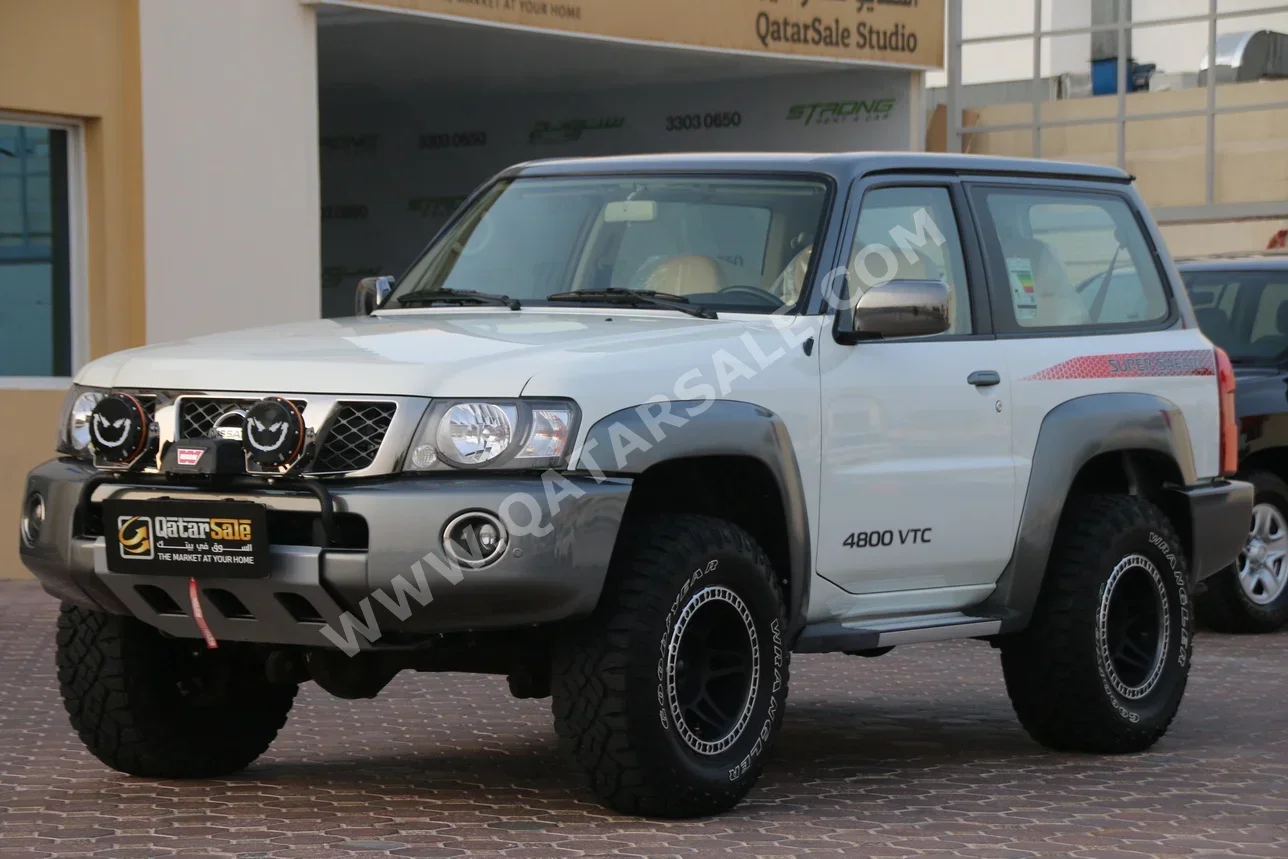 Nissan  Patrol  Super Safari  2022  Manual  16,000 Km  6 Cylinder  Four Wheel Drive (4WD)  SUV  White  With Warranty