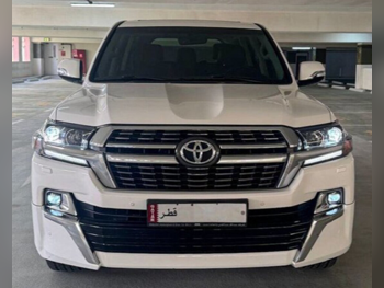 Toyota  Land Cruiser  GXR- Grand Touring  2021  Automatic  125,000 Km  8 Cylinder  Four Wheel Drive (4WD)  SUV  White