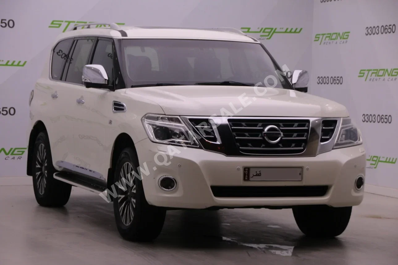 Nissan  Patrol  Platinum  2014  Automatic  167,000 Km  8 Cylinder  Four Wheel Drive (4WD)  SUV  White