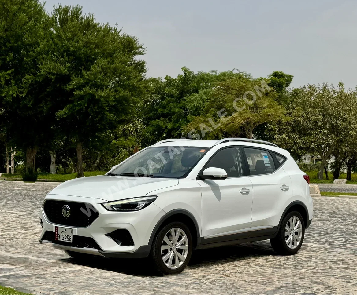 MG  Zs  2023  Automatic  32,000 Km  4 Cylinder  Front Wheel Drive (FWD)  SUV  White  With Warranty