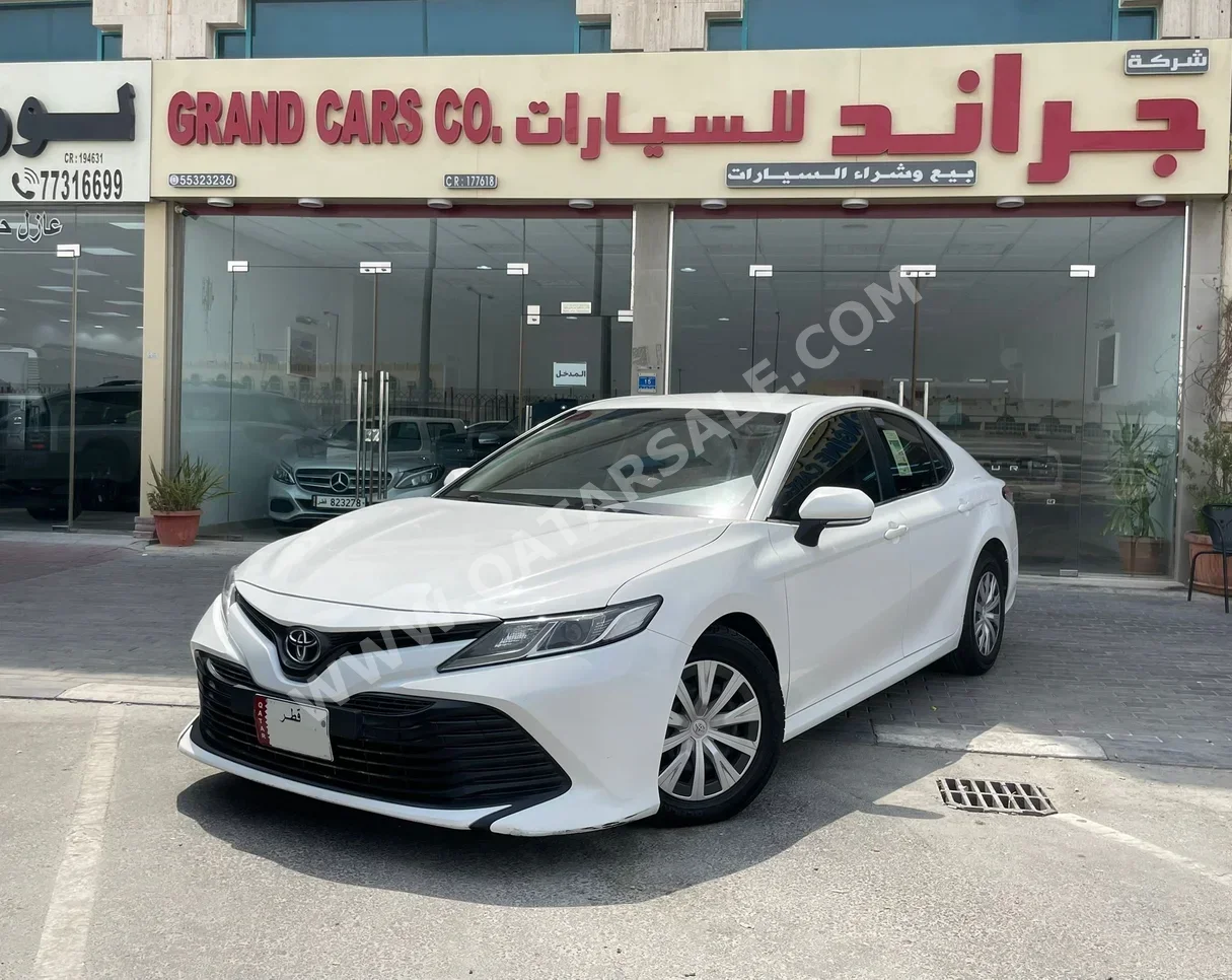 Toyota  Camry  LE  2018  Automatic  171,000 Km  4 Cylinder  Front Wheel Drive (FWD)  Sedan  White