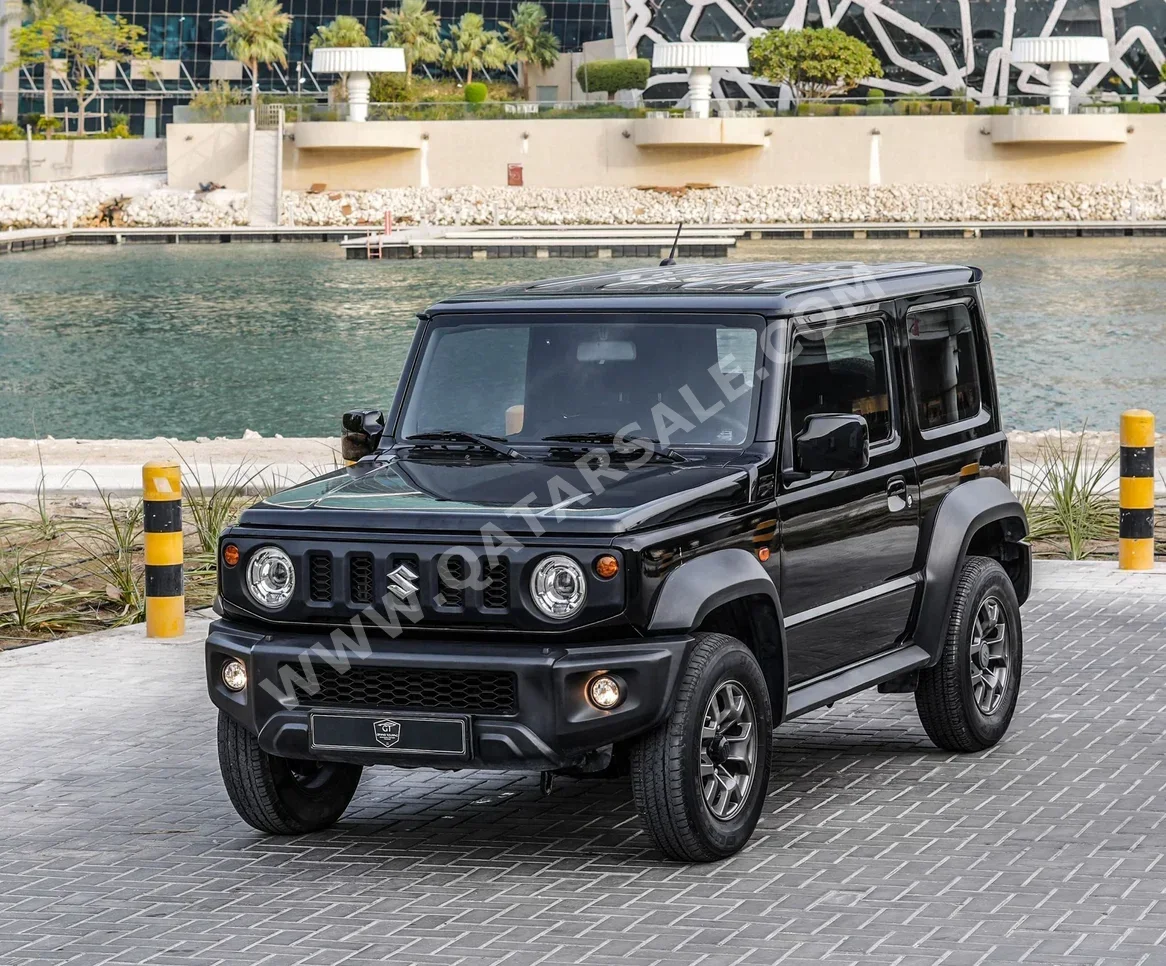Suzuki  Jimny  2023  Automatic  35,000 Km  4 Cylinder  Four Wheel Drive (4WD)  SUV  Black  With Warranty