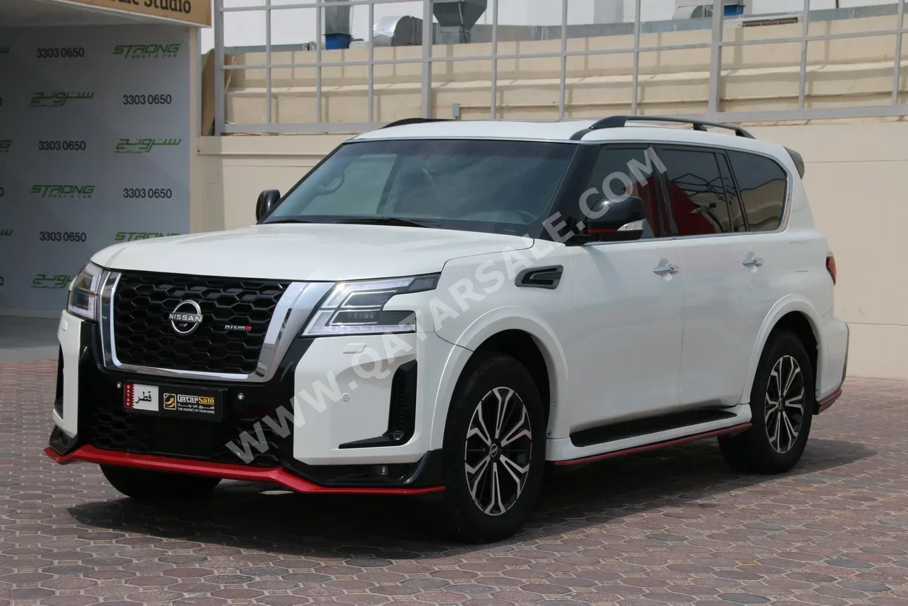 Nissan  Patrol  SE  2015  Automatic  288,000 Km  8 Cylinder  Four Wheel Drive (4WD)  SUV  White