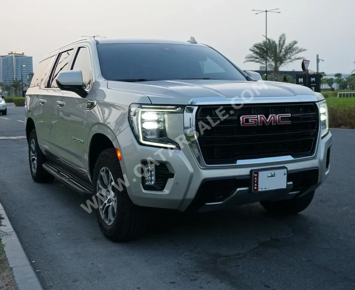 GMC  Yukon  XL  2023  Automatic  111,000 Km  8 Cylinder  Four Wheel Drive (4WD)  SUV  Gold  With Warranty