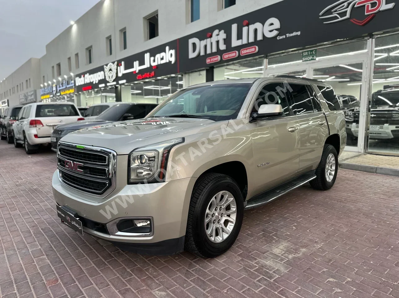 GMC  Yukon  SLE  2015  Automatic  136,000 Km  8 Cylinder  Rear Wheel Drive (RWD)  SUV  Beige