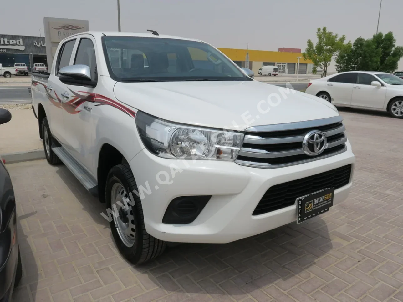 Toyota  Hilux  2022  Automatic  26,000 Km  4 Cylinder  Four Wheel Drive (4WD)  Pick Up  White