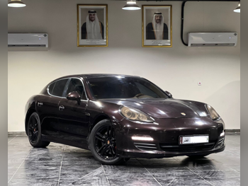 بورش  بانميرا  اس  2010  اوتوماتيك  210,000 كم  8 سلندر  دفع خلفي  سيدان  بني