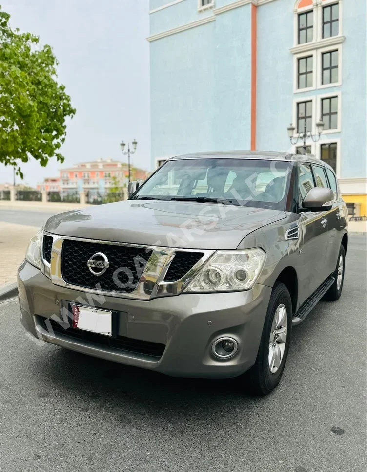 Nissan  Patrol  SE  2013  Automatic  345,000 Km  8 Cylinder  Four Wheel Drive (4WD)  SUV  Beige