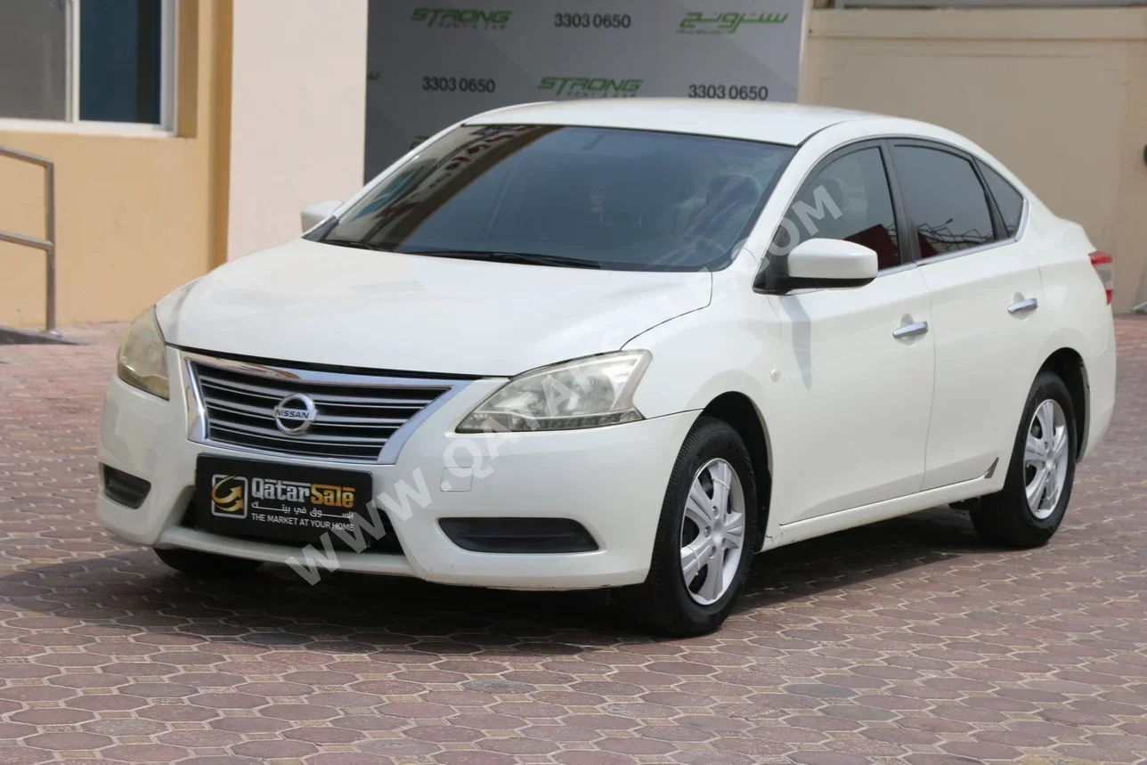 Nissan  Sentra  2014  Automatic  140,000 Km  4 Cylinder  Front Wheel Drive (FWD)  Sedan  White