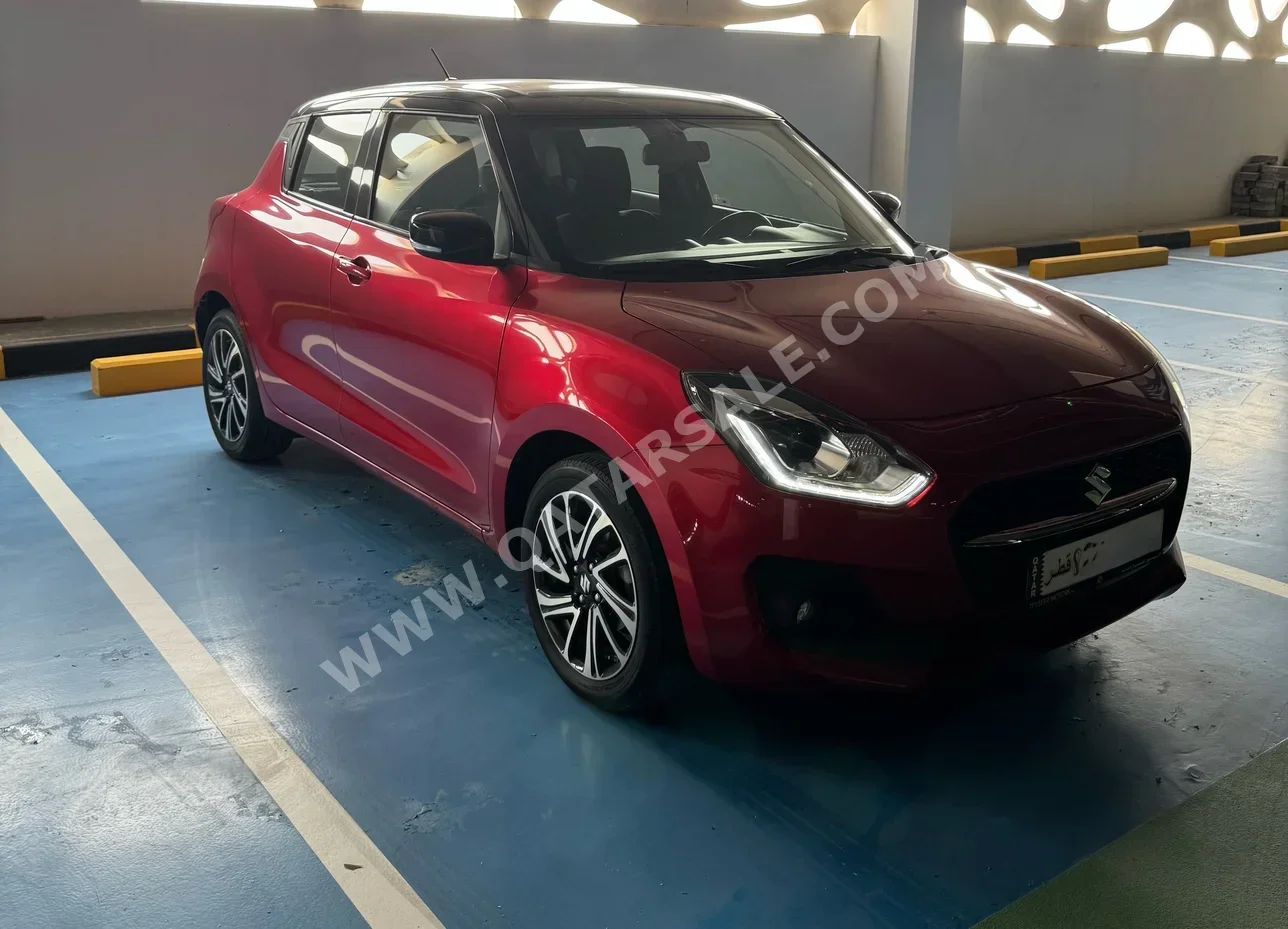 Suzuki  Swift  2023  Automatic  46,500 Km  4 Cylinder  Front Wheel Drive (FWD)  Hatchback  Red