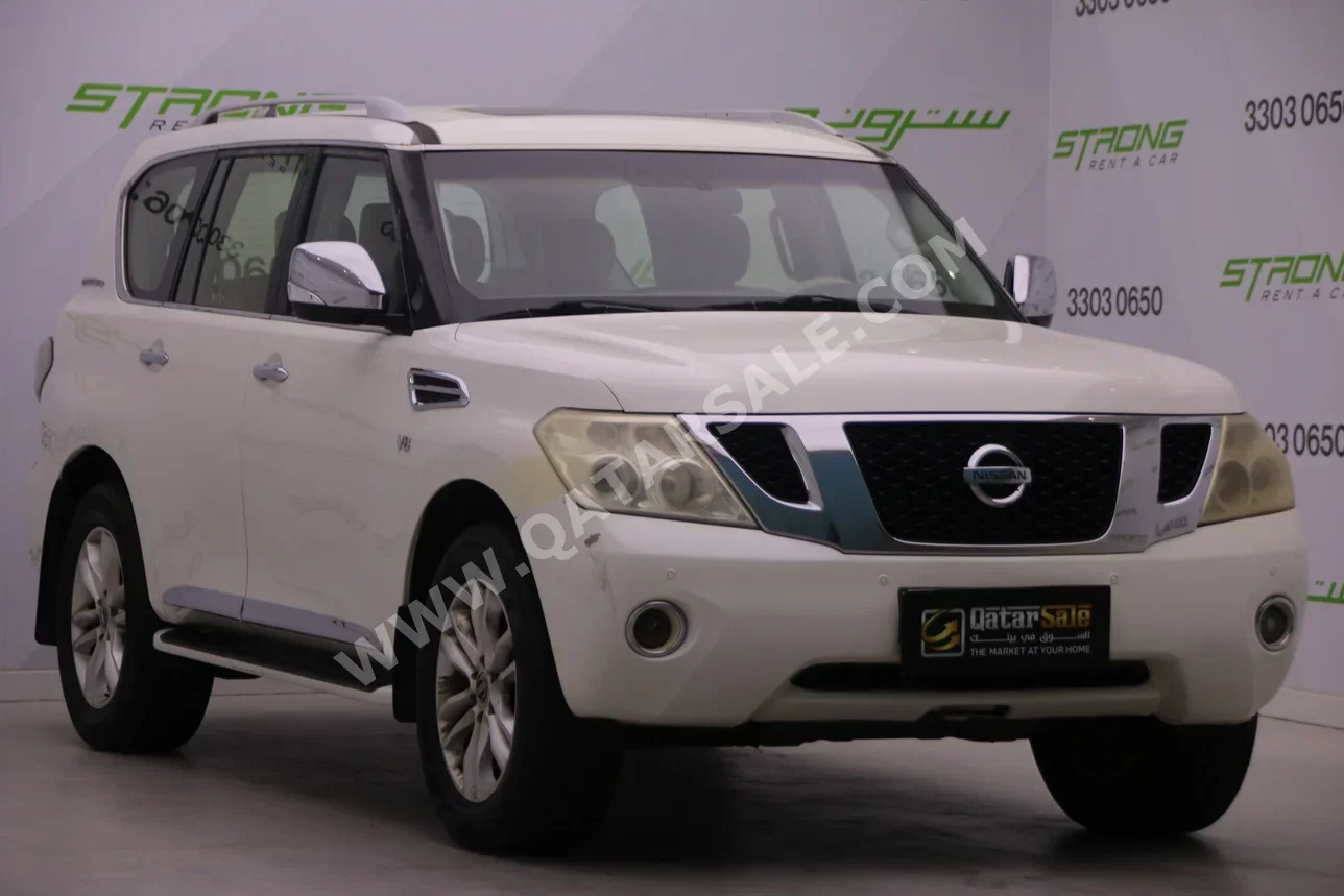 Nissan  Patrol  SE  2012  Automatic  305,000 Km  8 Cylinder  Four Wheel Drive (4WD)  SUV  White