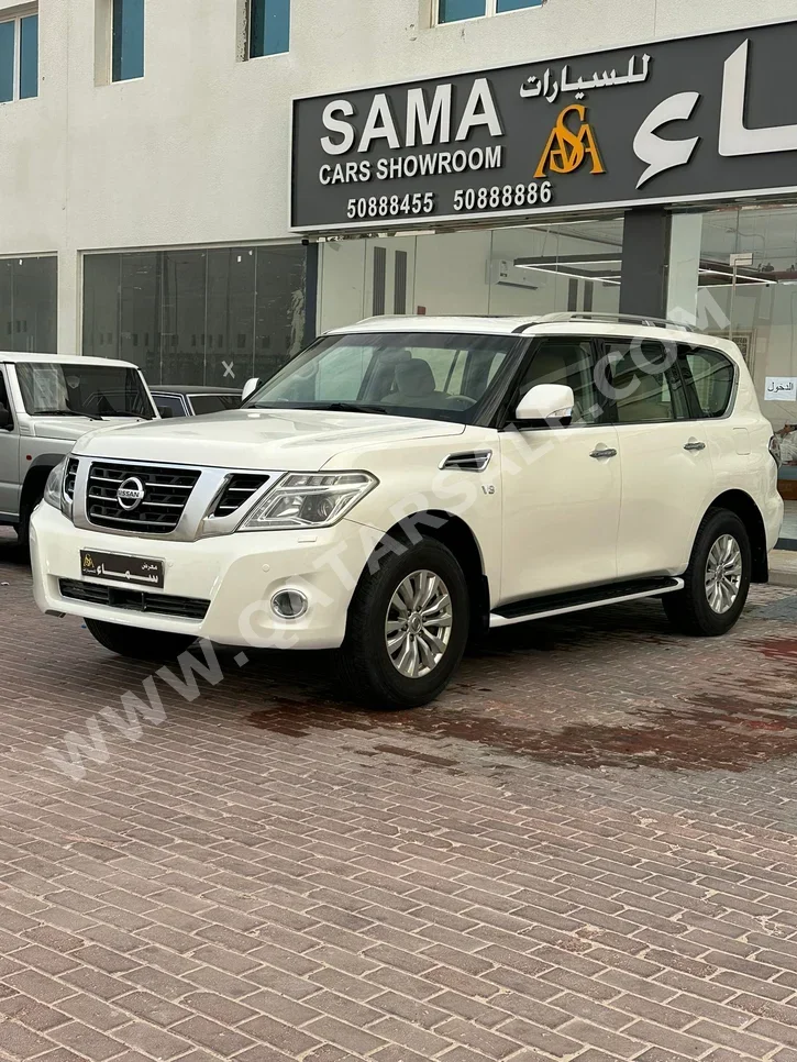 نيسان  باترول  اس اي  2015  اوتوماتيك  200,000 كم  8 سلندر  دفع رباعي  اس يو في  أبيض