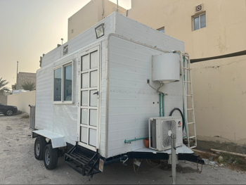 Caravan - 2022  - White  -Made in Qatar
