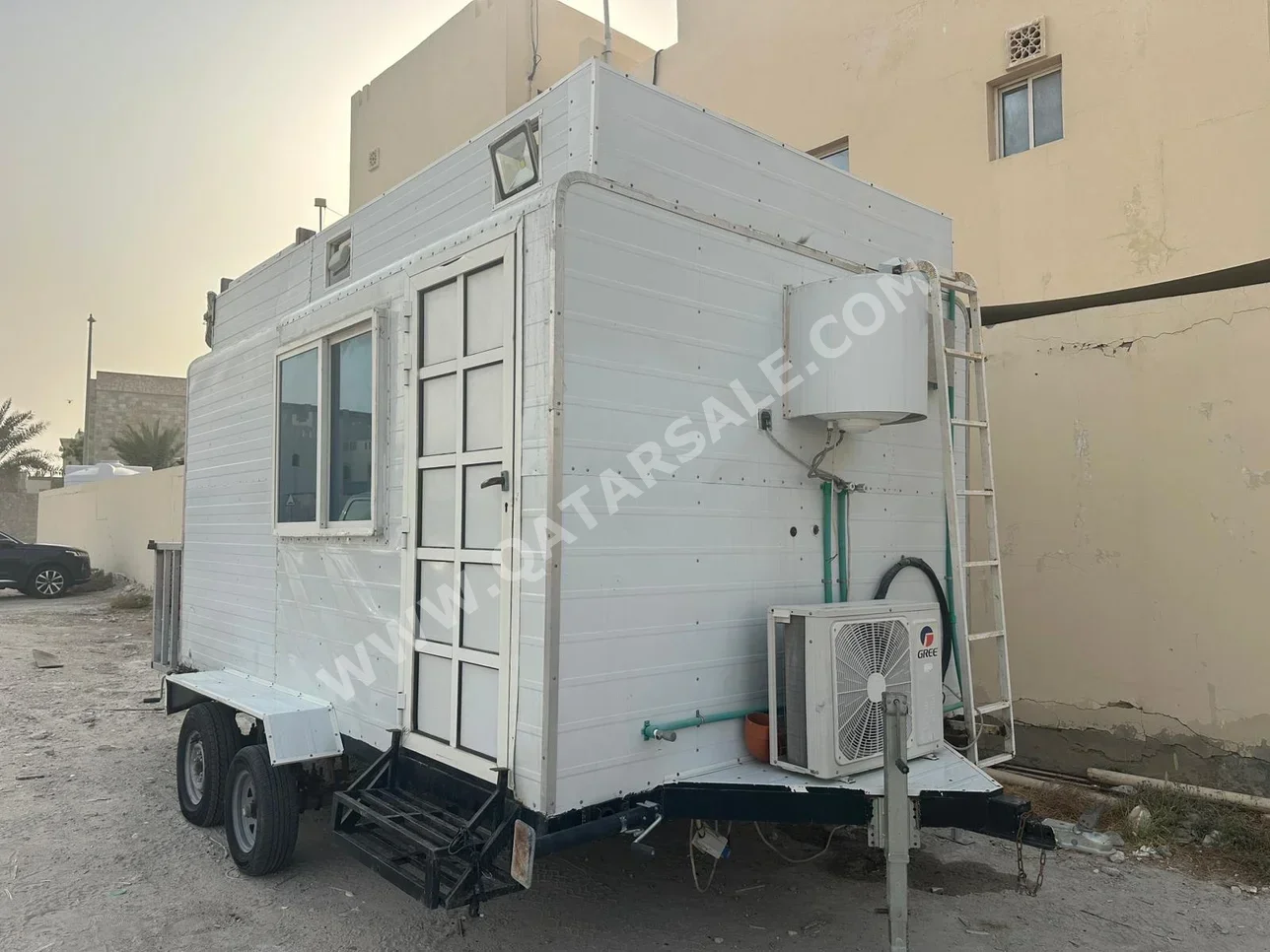 Caravan - 2022  - White  -Made in Qatar