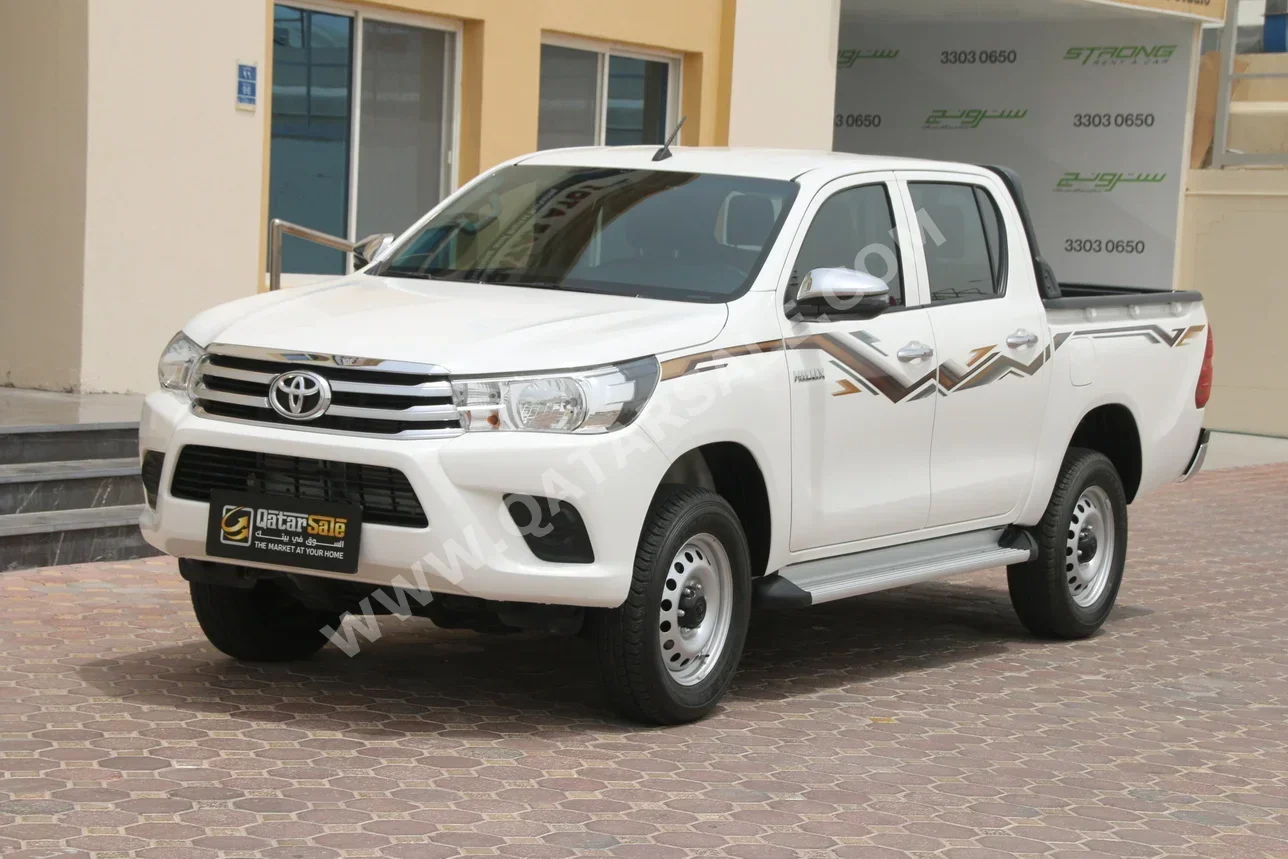 Toyota  Hilux  2024  Automatic  7,000 Km  4 Cylinder  Four Wheel Drive (4WD)  Pick Up  White  With Warranty