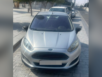 Ford  Fiesta  2014  Automatic  27,700 Km  4 Cylinder  Front Wheel Drive (FWD)  Hatchback  Silver  With Warranty