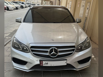 Mercedes-Benz  E-Class  300  2015  Automatic  93,750 Km  6 Cylinder  Rear Wheel Drive (RWD)  Sedan  Silver