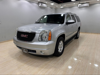 GMC  Yukon  XL  2011  Automatic  159,000 Km  8 Cylinder  Four Wheel Drive (4WD)  SUV  Light Gray