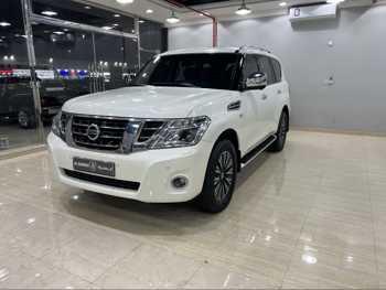Nissan  Patrol  Platinum  2014  Automatic  214,000 Km  8 Cylinder  Four Wheel Drive (4WD)  SUV  Pearl