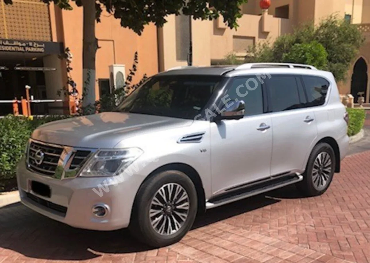 Nissan  Patrol  LE Platinum  2014  Automatic  215,000 Km  8 Cylinder  Four Wheel Drive (4WD)  SUV  Silver