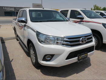 Toyota  Hilux  2021  Automatic  92,000 Km  4 Cylinder  Front Wheel Drive (FWD)  Pick Up  White