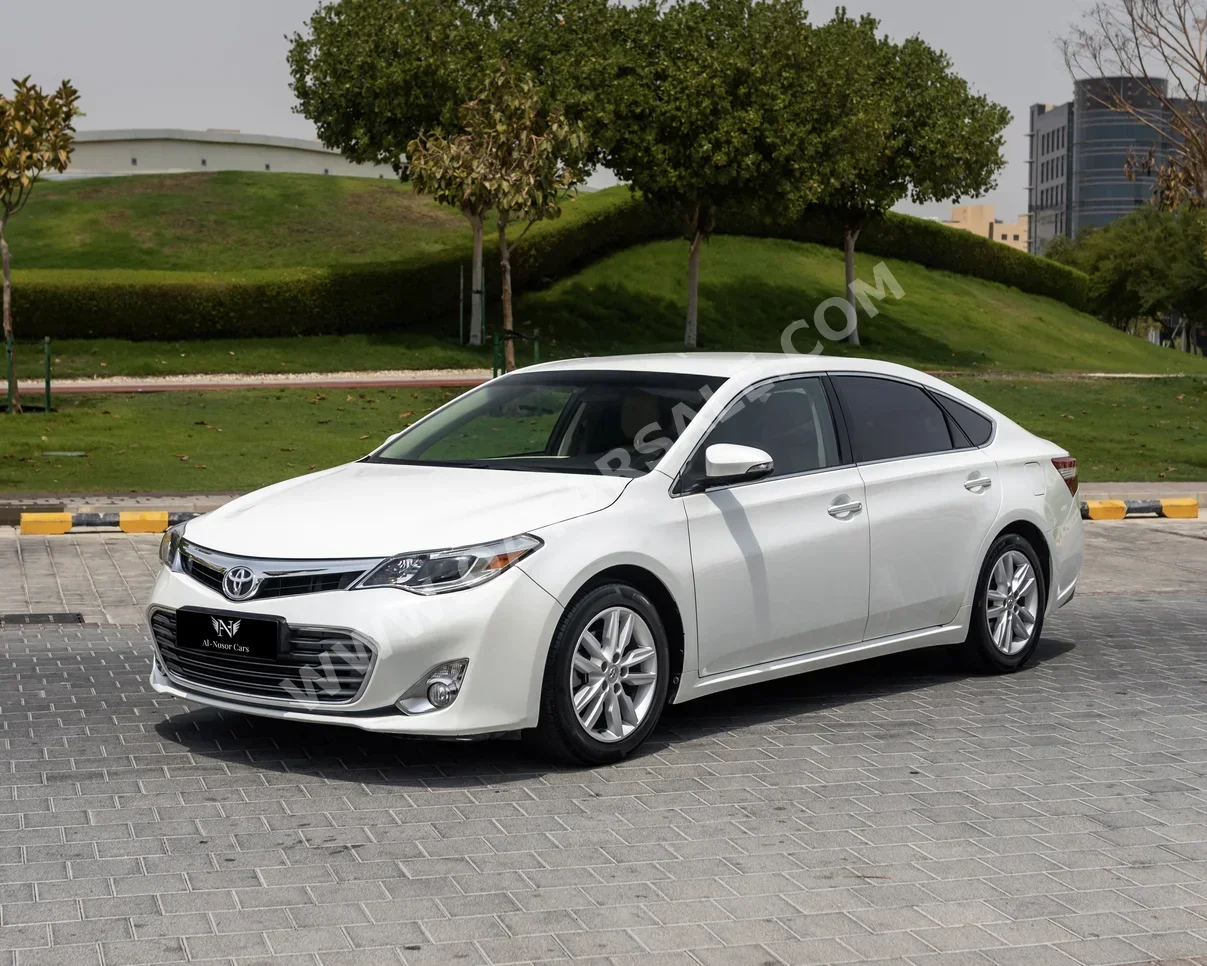 Toyota  Avalon  2014  Automatic  118,000 Km  6 Cylinder  Front Wheel Drive (FWD)  Sedan  White