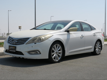 Hyundai  Azera  2014  Automatic  59,000 Km  4 Cylinder  Front Wheel Drive (FWD)  Sedan  White
