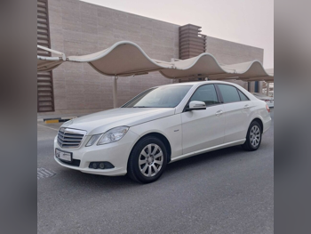 Mercedes-Benz  E-Class  200  2012  Automatic  200,000 Km  4 Cylinder  Sedan  Pearl