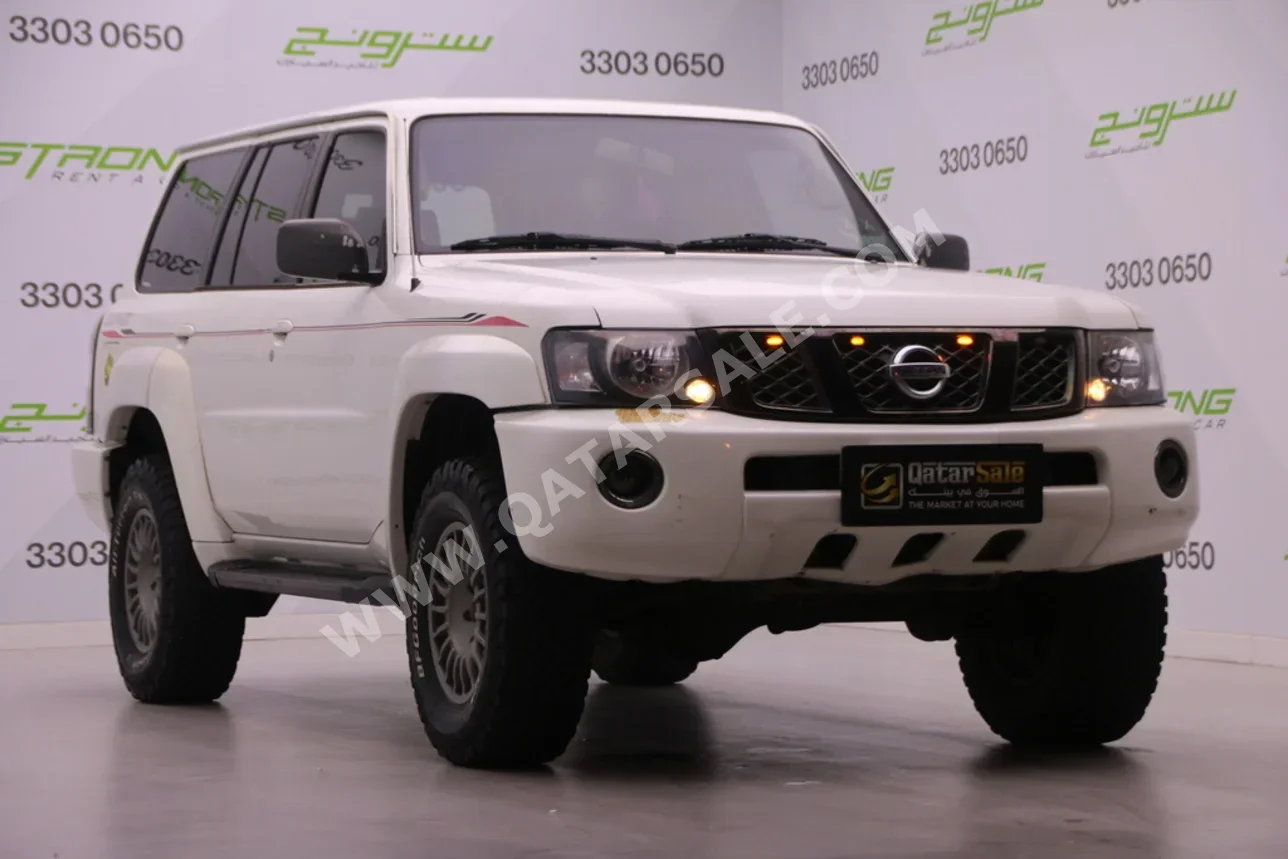 Nissan  Patrol  Safari  2005  Automatic  270,000 Km  6 Cylinder  Four Wheel Drive (4WD)  SUV  Pearl