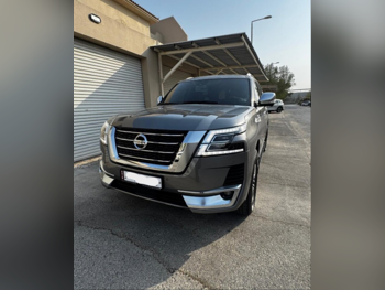 Nissan  Patrol  Platinum  2021  Automatic  24,000 Km  6 Cylinder  All Wheel Drive (AWD)  SUV  Dark Gray